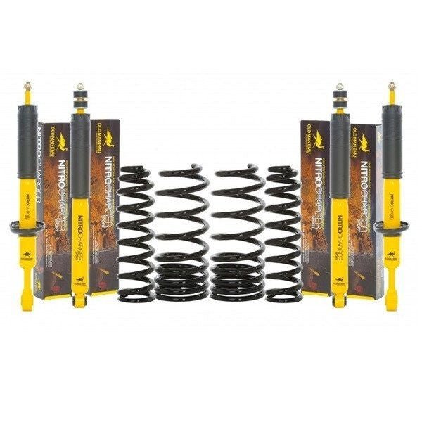 Yellow Nitrocharger shocks and black coil springs for Toyota 4Runner medium load suspension lift kit, front and rear view.