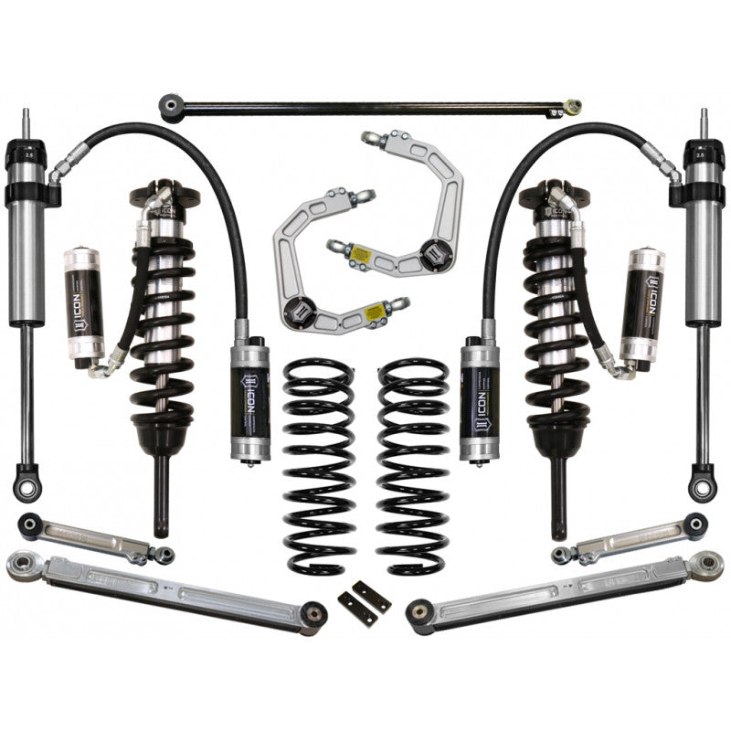 Complete Stage 4 suspension system with coilovers, springs, control arms, and remote reservoirs for 2010-2014 Toyota FJ Cruiser.