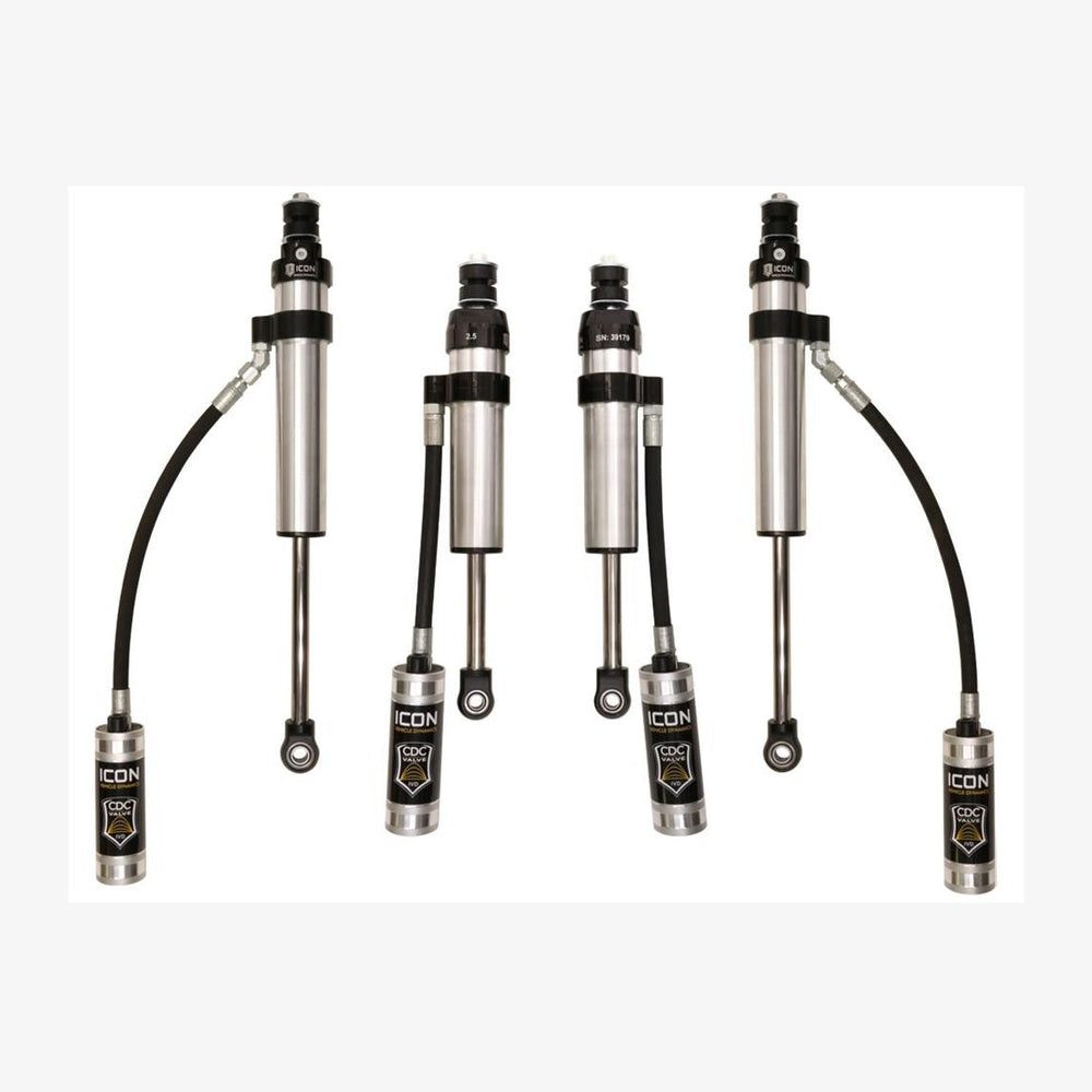 Set of four silver ICON Stage 3 performance shocks with remote reservoirs for Toyota Land Cruiser 100 Series and Lexus LX470.