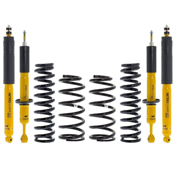 Yellow shock absorbers and black coil springs for Lexus GX470 suspension lift kit, arranged side by side on white background.