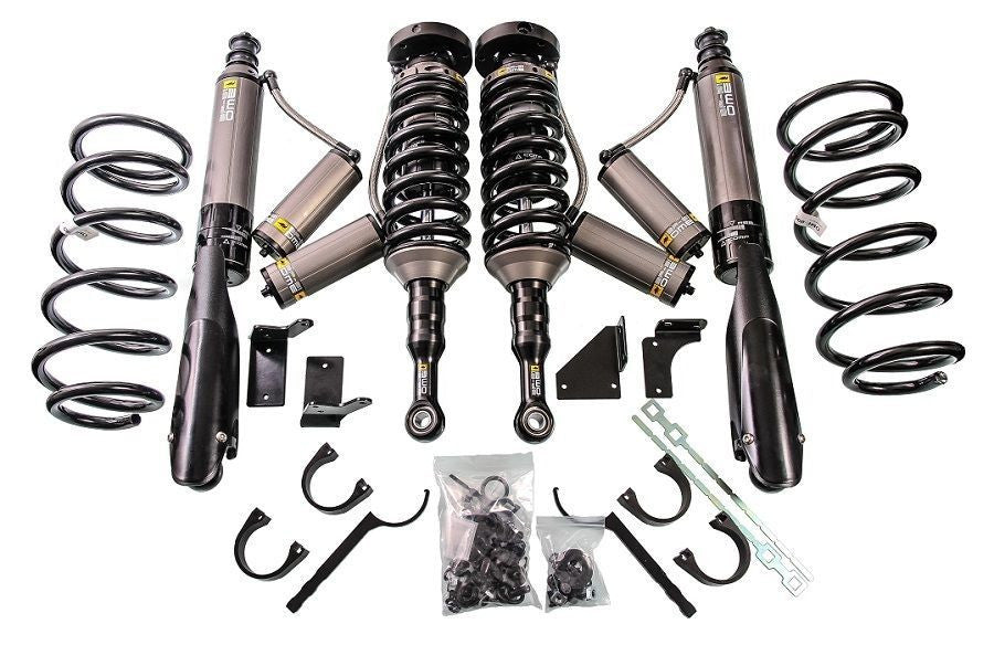 Complete suspension kit with shocks, coil springs, and mounting hardware for 200 Series Land Cruiser 1.5-2 inch lift with KDSS.