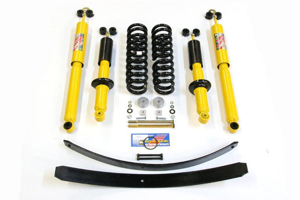 Complete heavy load suspension kit for 1998-2004 Tacoma, including shocks, springs, leaf springs, and hardware.