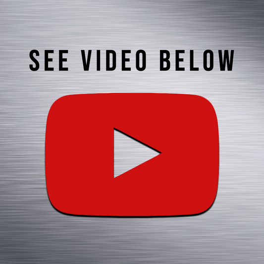 Red YouTube play button icon on brushed metal background with text "See video below" above it.