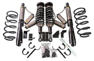Complete set of black and gray suspension coilovers, shocks, springs, and mounting hardware for 2010 4Runner KDSS heavy-duty kit.
