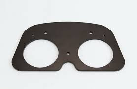 Black metal bezel with two circular openings for FJ40 Land Cruiser gauge cluster installation.