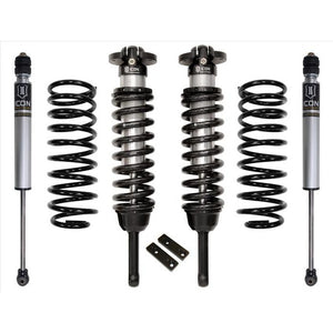 Complete ICON Stage 1 suspension system with shocks and coil springs for 2010+ Toyota 4Runner, laid out on white background.