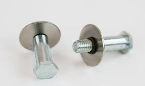 Close-up of a pair of metal tube door striker posts with hex heads and washers for FJ Cruiser installation.