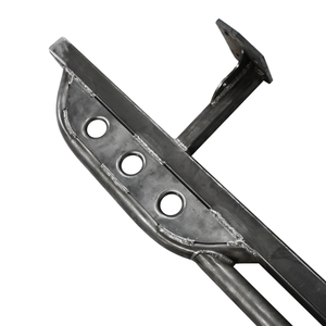 Close-up of heavy-duty metal rock slider with three circular cutouts and welded mounting bracket for 2010 4Runner.