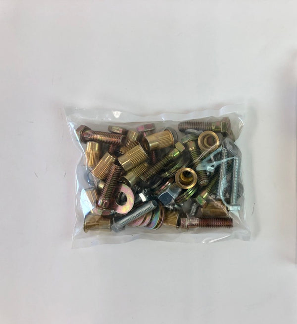Clear plastic bag containing assorted bolts, washers, and nuts for Land Cruiser rock slider hardware replacement.