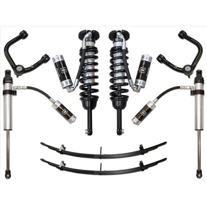 Complete Stage 5 suspension system with tubular upper control arms and remote reservoir shocks for 2016+ Toyota Tacoma.