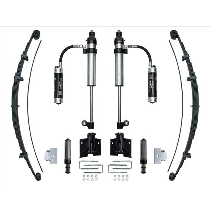 Complete Icon Stage 2 rear suspension system for 2005 and up Toyota Tacoma, including shocks, leaf springs, and mounting hardware.
