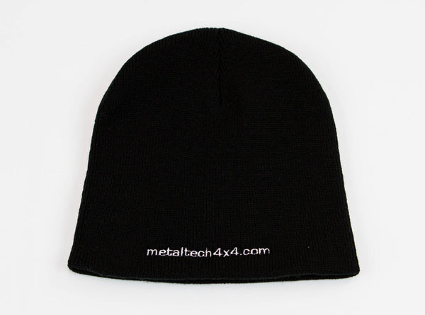 Black knit beanie with white embroidered "metaltech4x4.com" logo on front edge.