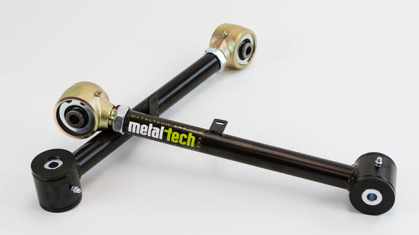 Pair of black Metal Tech rear upper suspension links for 100 Series Land Cruiser and LX470, shown on white background.