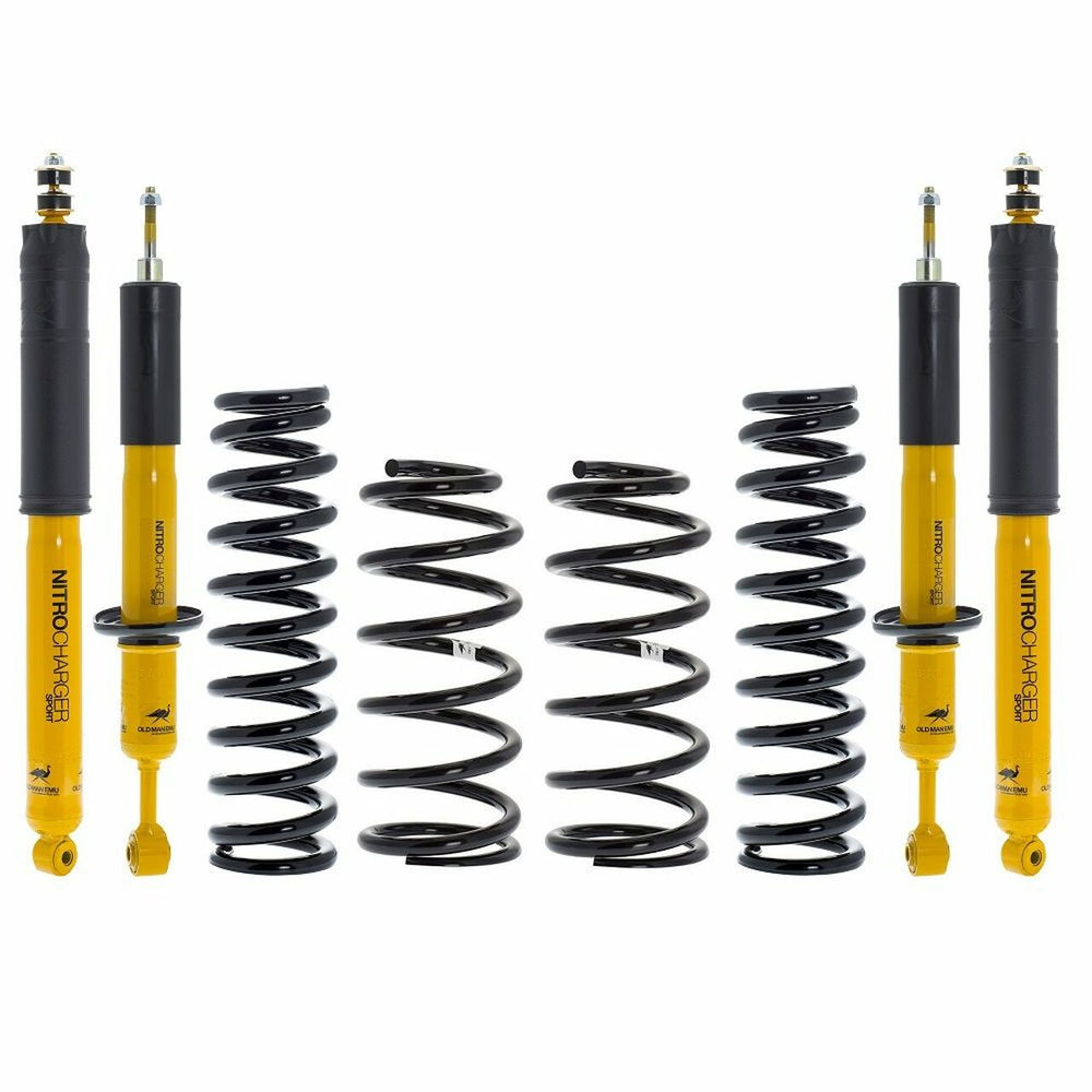Set of four black coil springs and four yellow Nitrocharger Sport shock absorbers for FJ Cruiser suspension lift.