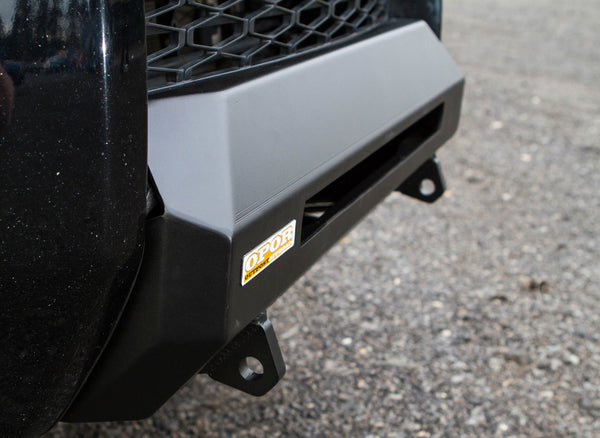 Close-up of black MetalTech 4x4 Stronghold winch bumper installed on 2014 Toyota 4Runner front end.