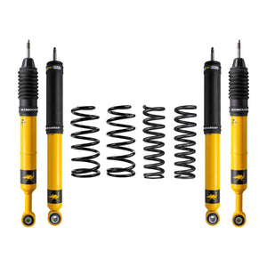 Yellow and black Nitrocharger shock absorbers with four black coil springs for 2-inch lift suspension kit.