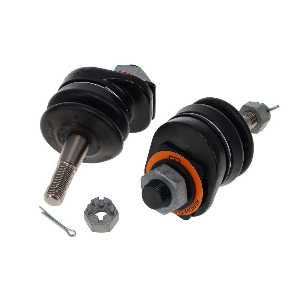 Two black replacement ball joints with metal studs, nuts, and cotter pins on a white background.