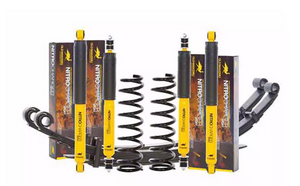 Old Man Emu 3-inch lift kit for 2005 Tacoma with yellow Nitrocharger shocks, coil springs, and leaf springs.