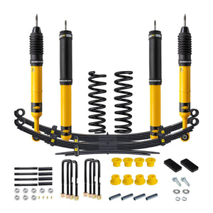 Complete heavy load suspension kit with yellow shocks, coil springs, leaf springs, and mounting hardware for 2005-15 Tacoma.