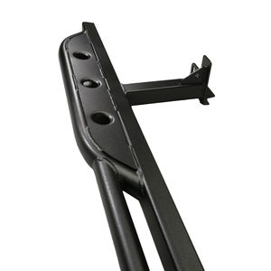 Close-up of black metal rock slider with mounting bracket for 2016 Tacoma 4-door long bed.