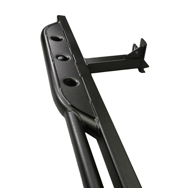 Close-up of black metal rock slider with mounting bracket for 2016 Tacoma 4-door long bed.