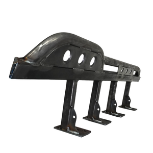 Raw metal rock slider with circular cutouts and mounting brackets, designed for FJ Cruiser off-road protection.