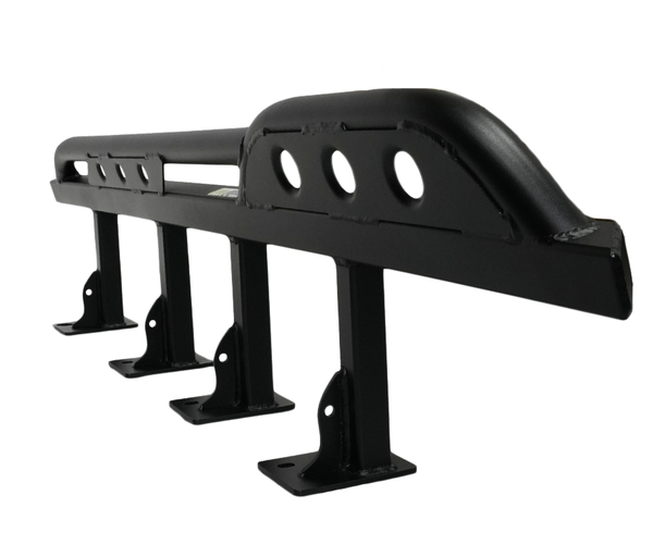 Black metal rock slider with mounting brackets, designed for off-road protection on FJ Cruiser vehicles.