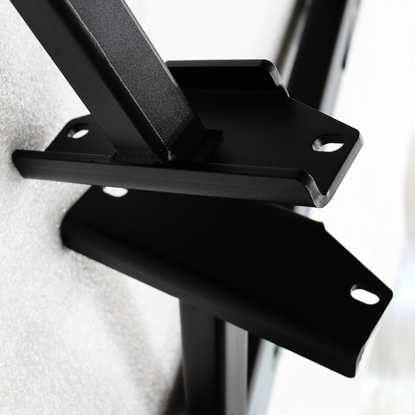 Close-up of black powder-coated steel mounting brackets for 2003-09 4Runner Metal Tech 4x4 rock sliders.