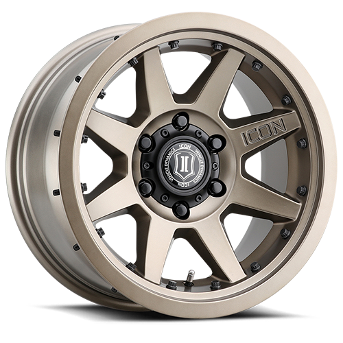 17-inch bronze finish Rebound Pro wheel with 6x5.5 bolt pattern, eight spokes, and black center cap.