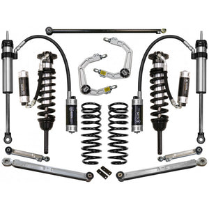 Complete Stage 4 suspension system with coilovers, springs, control arms, and remote reservoirs for 2010-2014 Toyota FJ Cruiser.