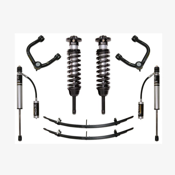 Complete Stage 3 suspension system with tubular upper control arms, coilover shocks, leaf springs, and remote reservoirs for 2005-2015 Toyota Tacoma.