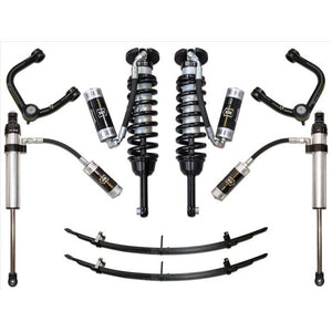 Complete Stage 5 suspension system with tubular upper control arms for 2005-2015 Toyota Tacoma, including shocks and leaf springs.