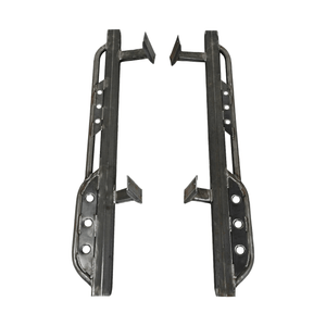 Pair of raw steel rock sliders for 100 Series Land Cruiser LX470, showing mounting brackets and tubular side protection.