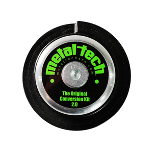 Close-up of Metal Tech rear coil conversion kit component with black and silver finish and green logo text.