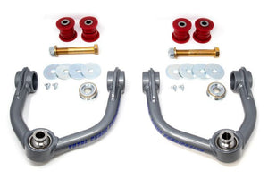Pair of gray upper control arms with red bushings, washers, bolts, and bearings for 2000-2006 Tundra and 2001-2007 Sequoia.