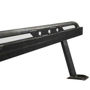 Close-up of black metal rock slider bracket with mounting plate and welded support arm for 80 Series Land Cruiser LX450.