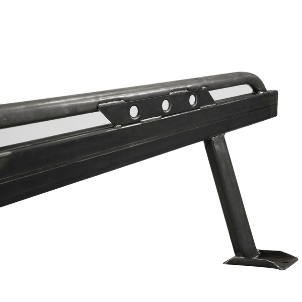 Close-up of black metal rock slider bracket with mounting plate and welded support arm for 80 Series Land Cruiser LX450.