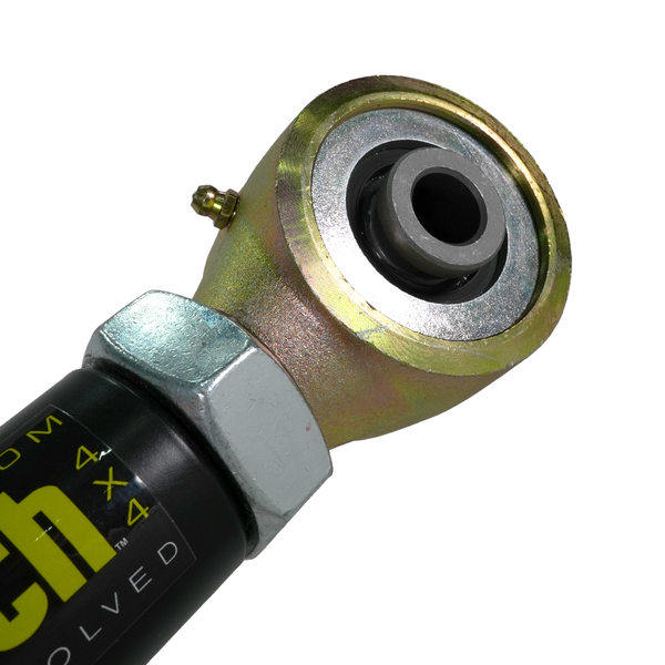 Close-up of Metal Tech 4x4 rear link bundle upper link rod end with grease fitting and black body.
