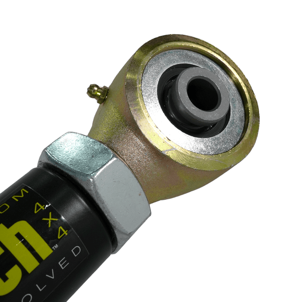 Close-up of metal Tech offset rear lower link with grease fitting for 2001-2007 Sequoia suspension upgrade.