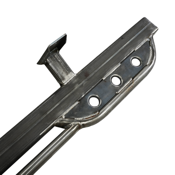 Close-up of raw steel rock slider with mounting bracket and three circular bolt holes for 100 Series Land Cruiser LX470.