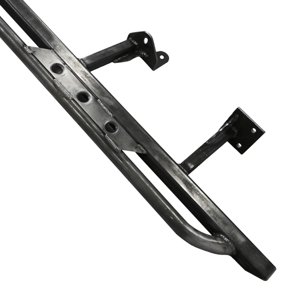 Close-up of raw metal rock slider with mounting brackets for Lexus GX470 off-road protection.
