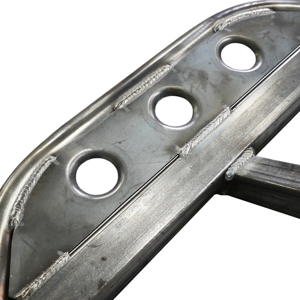 Close-up of metal rock slider with circular cutouts and reinforced welds for 2010-2013 4Runner SR5 and Limited models.