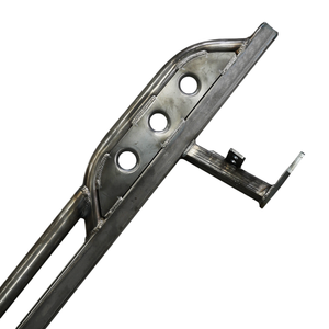 Close-up of raw metal rock slider with mounting bracket for 2010-2013 Toyota 4Runner SR5 and Limited models.