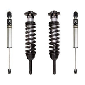Front and rear coilover shocks for 2016-up Toyota Tacoma suspension system stage 1, silver and black finish.