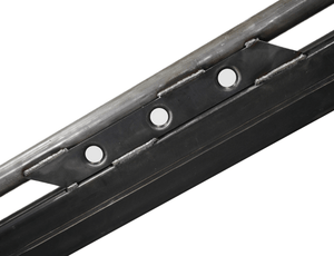 Close-up of black steel rock slider bracket with three mounting holes and welded round tubing for 80 Series Land Cruiser.