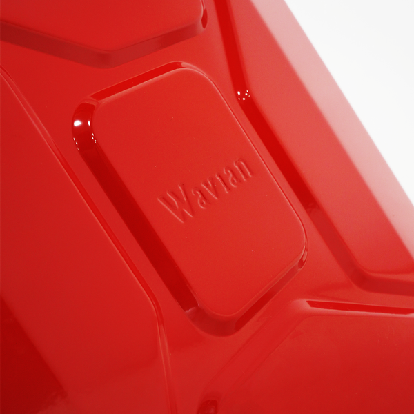Close-up of the red Wavian fuel can showing the embossed brand name on its smooth surface.