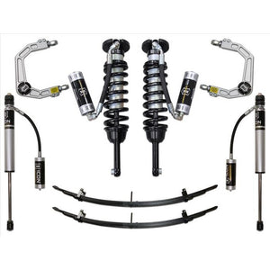 Complete Stage 4 suspension system with coilovers, shocks, leaf springs, and billet upper control arms for 2005-2015 Toyota Tacoma.