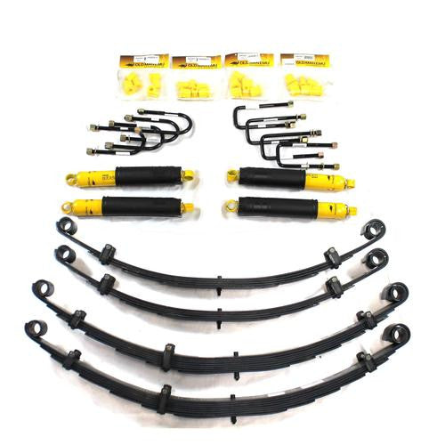 Complete heavy-duty suspension kit with leaf springs, shock absorbers, and mounting hardware for 2-inch lift on FJ60-62 Pre-86 gasoline models.