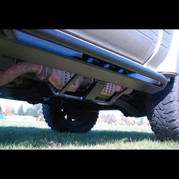 Close-up view of black Metal Tech rock slider installed on 80 Series Land Cruiser LX450, showing undercarriage protection.
