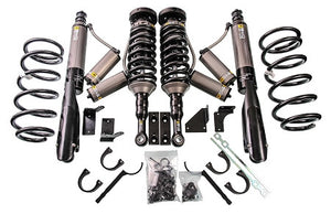 Complete suspension kit for 2010-14 FJ Cruiser with heavy load 2.5-3 inch lift, including shocks, springs, and hardware.